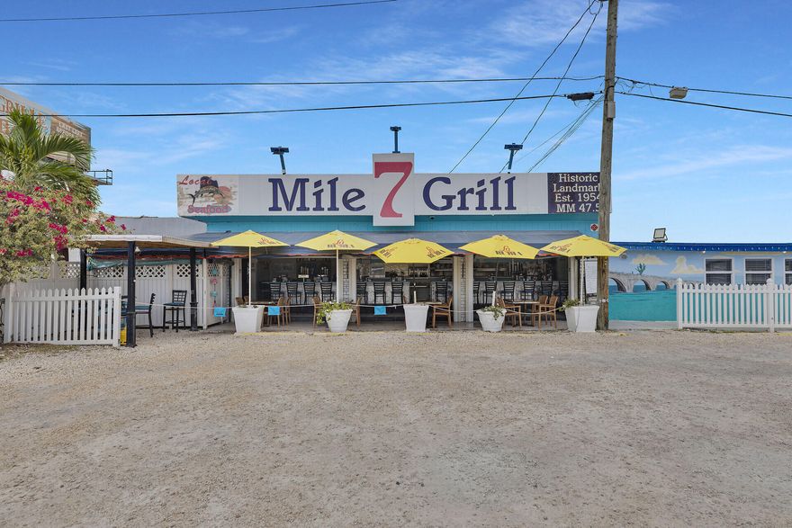 Multi-Parcel Waterfront Offering  Iconic 7 Mile Grill

This rare multi-parcel package in Marathon, FL combines an iconic waterfront restaurant, residential property, development rights, and dockage. 

1240 Overseas Hwy is home to the renowned 7 Mile Grill. Operating with a transferable beer and wine license, the operation serves year round breakfast, lunch and dinner. 

A transferable submerged land lease allows for continued use of the 129' of waterfront for boating access.

The parcel carries an additional development right for a single-family home and included in the sale is an additional single-family home with 4 beds/1 bath (1230 Overseas Hwy).

The US1 front exposure offers exceptional exposure.