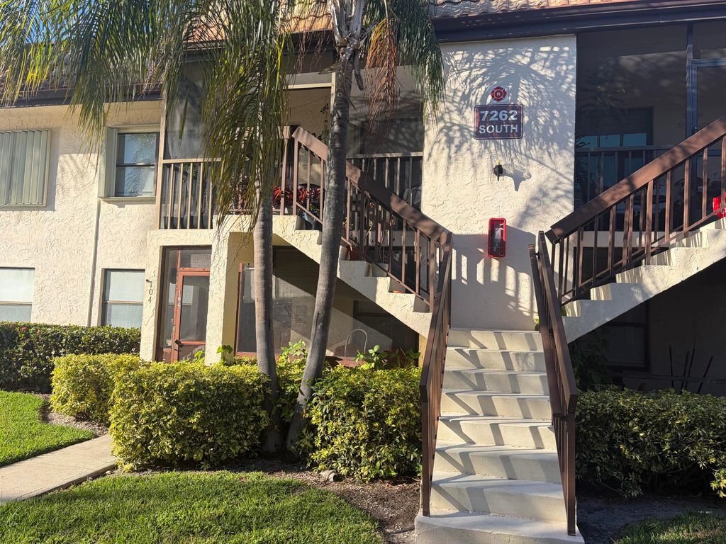 Photo of 7262 Golf Colony Ct, Greenacres, FL 33467 (MLS # B26000086)