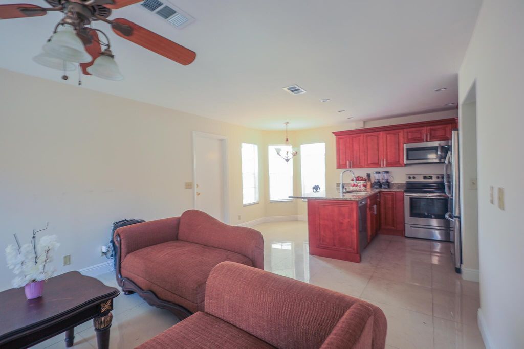 Photo of 1356 N Climbing Rose Ln, West Palm Beach, FL 33415 (MLS # R11094873)