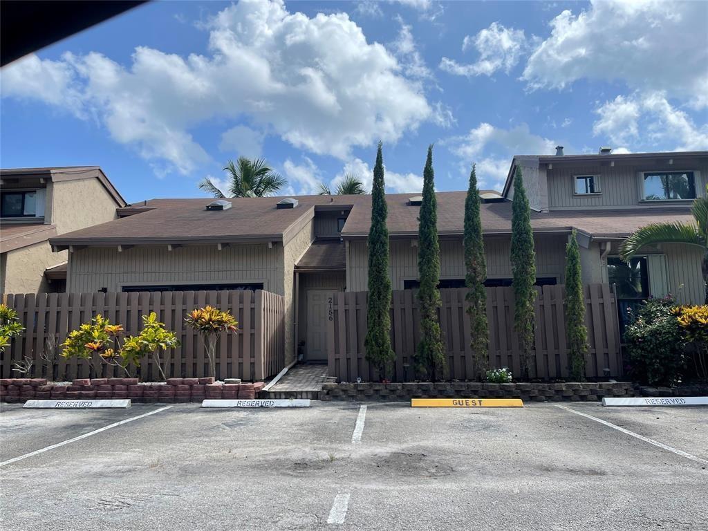 "THE ESCAPE" AT ARROWHEAD--2 BEDROOMS--LOFT STYLE---MASTER UPSTAIRS 24X16 WITH 8X7 WALK IN CLOSET---2 BATHS---ON WATER WITH GOLF COURSE VIEW------CURRENT TENANT HERE MONTH TO MONTH---SHOWN BY APPT----IMPACT WINDOWS/DOORS (2021)---BATHROOMS REMODELED IN 2023 WITH WOOD STYLE TILING & QUARTZ COUNTER TOPS---BACK YARD BAR IN 2019-----KITCHEN HAS STAINLESS STEEL FRENCH DOOR REFRIGERATOR---OVEN ----DISHWASHER & MICROWAVE NEW IN 2023----PLUS PANTRY ---2ND FLOOR HAS ADDITIONAL MINISPLIT AC FOR BONUS COOLING-----CAN RENT RIGHT AWAY!!!----COMMUNITY POOL---TENNIS AND BASKETBALL-- LOCATED IN THE HEART OF DAVIE------MINUTES FROM ALL SCHOOLS-----PARKS ----RESTAURANTS-----SHOPPING----MALLS-----ENTERTAINMENT VENUES-----CASINOS---AIRPORTS AND THE BEACHES------ALLOW HOA APPRX 30 DAYS TO PROCESS APPLICATION