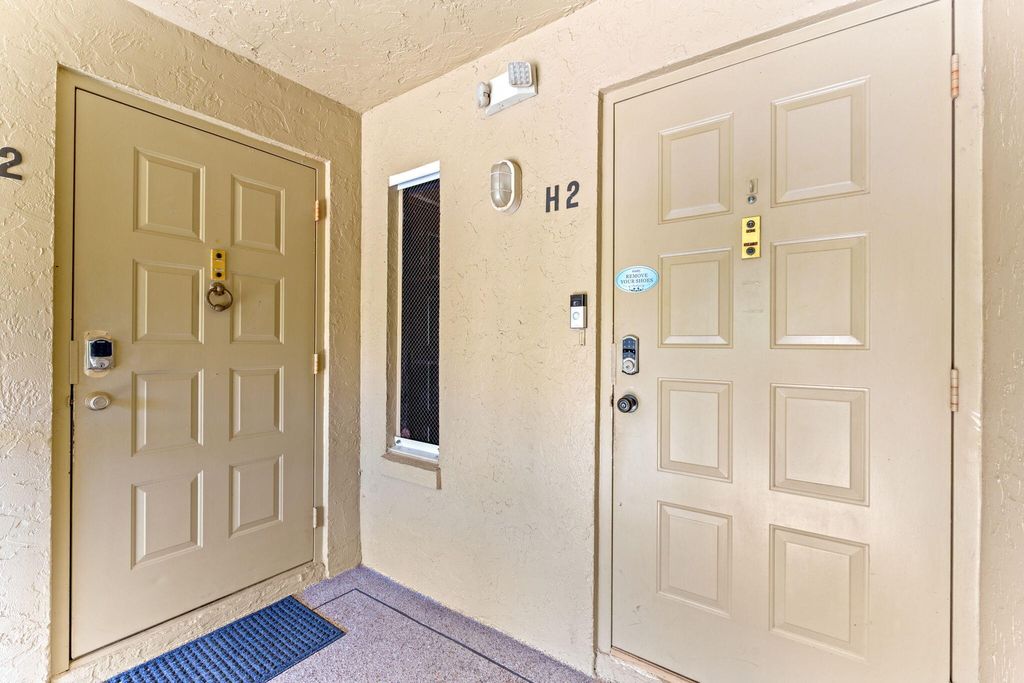 Photo of 723 Sunny Pine Way #H2, Greenacres, FL 33415 (MLS # R11164360)