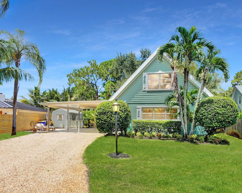 Photo of 1407 SW Peninsula Lane, Palm City, FL 34990 (MLS # R11007587)