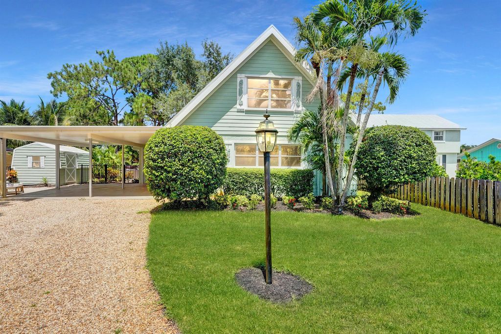 Photo of 1407 SW Peninsula Lane, Palm City, FL 34990 (MLS # R11007587)