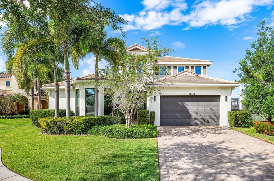 Discover a beautifully upgraded lakefront residence in the exclusive enclave of Boca Reserve. Built in 2014 and enhanced with high end finishes, this property offers a rare combination of luxury, functionality, and privacy. The home features 4 bedrooms plus a flexible bonus room that can serve as a 5th bedroom, office, playroom, or gym, along with 3 full and 2 half baths and an oversized 3 car garage with extended depth.The main level includes a spacious primary suite with serene water views, a second ensuite bedroom ideal for guests or multigenerational living, and a versatile bonus space. The chef style kitchen, elegant custom details, and seamless indoor outdoor layout make everyday living and entertaining effortless. Outside, enjoy a fenced backyard with a pool spa and summerkitchen
