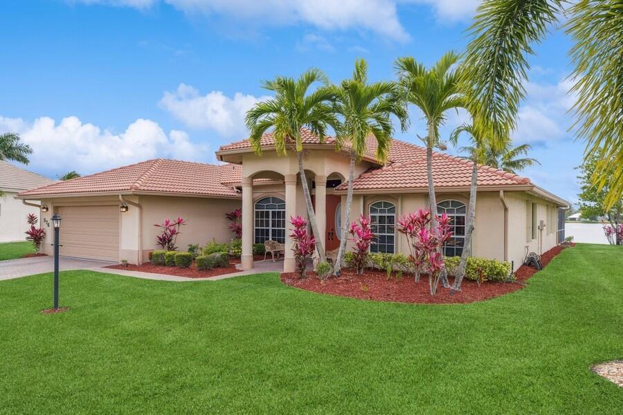 Spectacular Lake view pool home in gated community of Sanctuary. Whole house Generac generator, complete upgrades in kitchen & all bathrooms. Large pantry with pull out shelves. Decorative Fireplace with heater. Oversized 3-ton AC unit. Quartz countertops in all bathrooms. Solar heated pool with screened Lanai. Hardwood floors, 4 walk in closets. Ring Doorbell and ADT Security system. Crown molding throughout. Lake irrigation with new pump. Accordion shutters. Built by Royal Professional Builders - poured concrete with rebar. Most furniture negotiable. CALL FOR GATE ENTRY
