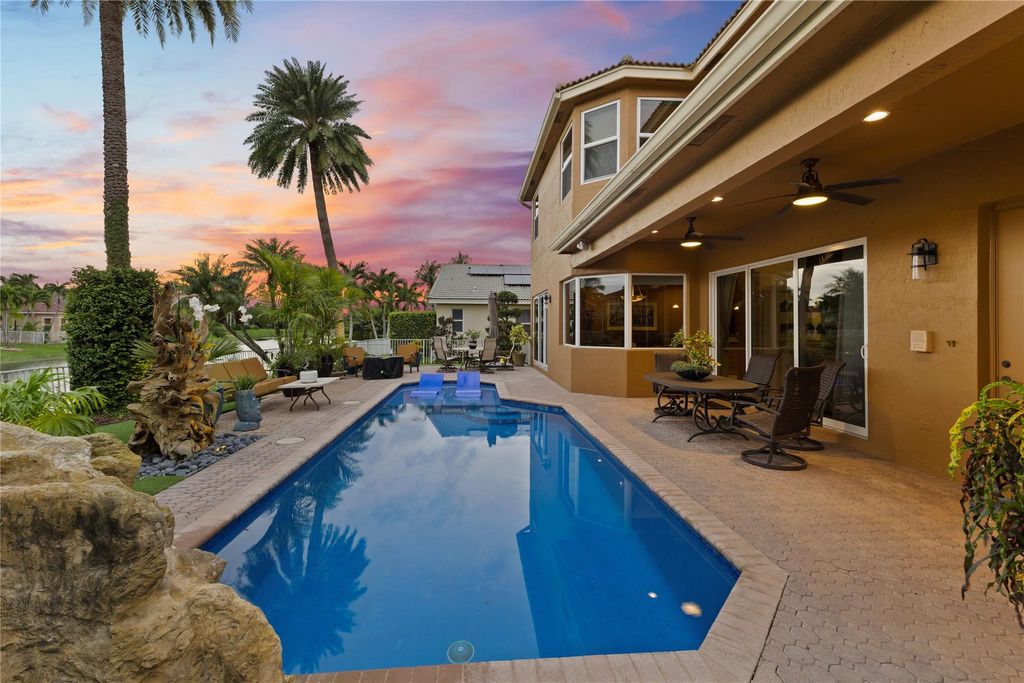 Photo of 12064 NW 49th Dr, Coral Springs, FL 33076 (MLS # F10527452)
