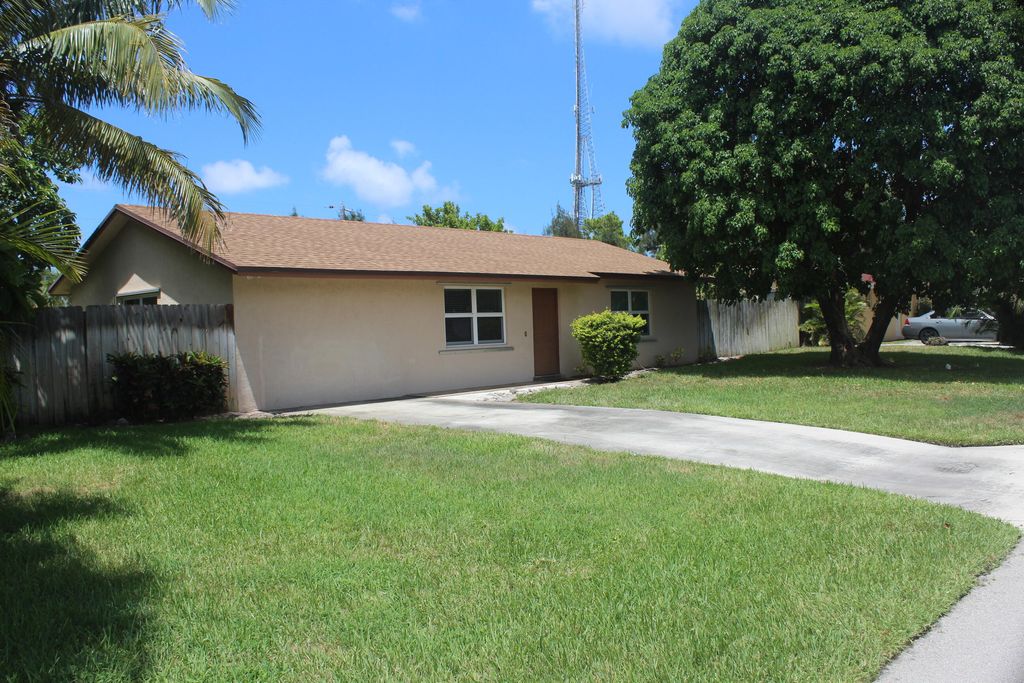 Photo of 1605 Sherwood Drive, Mangonia Park, FL 33407 (MLS # R11007271)