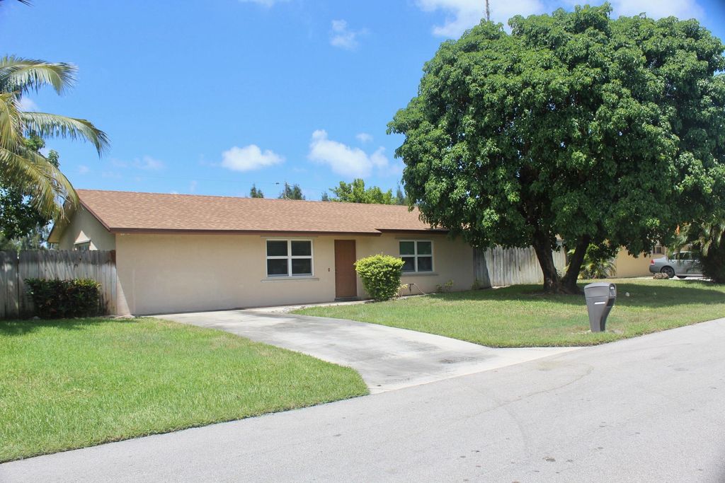 Photo of 1605 Sherwood Drive, Mangonia Park, FL 33407 (MLS # R11007271)