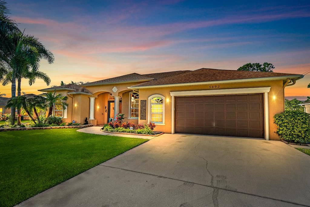 Photo of 5892 NW Dowse Street, Port Saint Lucie, FL 34986 (MLS # R10762795)