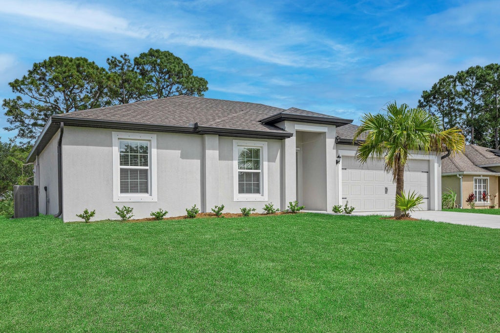 Photo of 1013 SW Fisherman Avenue, Port Saint Lucie, FL 34953 (MLS # B26044554)