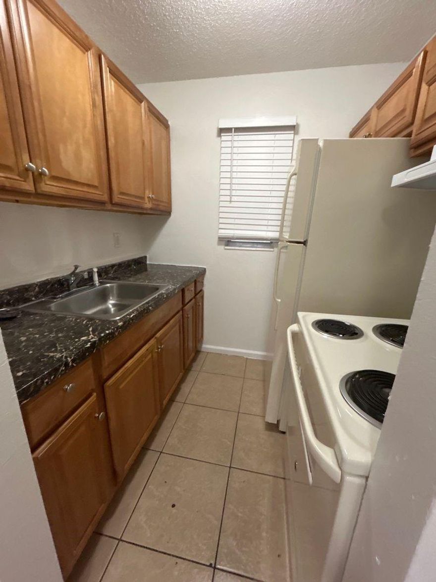 Welcome to this lovely 1 bedroom, 1 bathroom apartment located in Lake Worth, Florida. This cozy and inviting apartment is perfect for those who want to experience the relaxed coastal lifestyle of one of South Florida's most charming cities. As you enter the apartment, you'll immediately notice the bright and airy atmosphere. The kitchen is fully equipped with a refrigerator and stove.