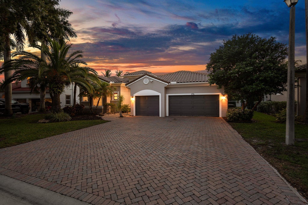 Photo of 876 NW 123rd Drive, Coral Springs, FL 33071 (MLS # B26044329)