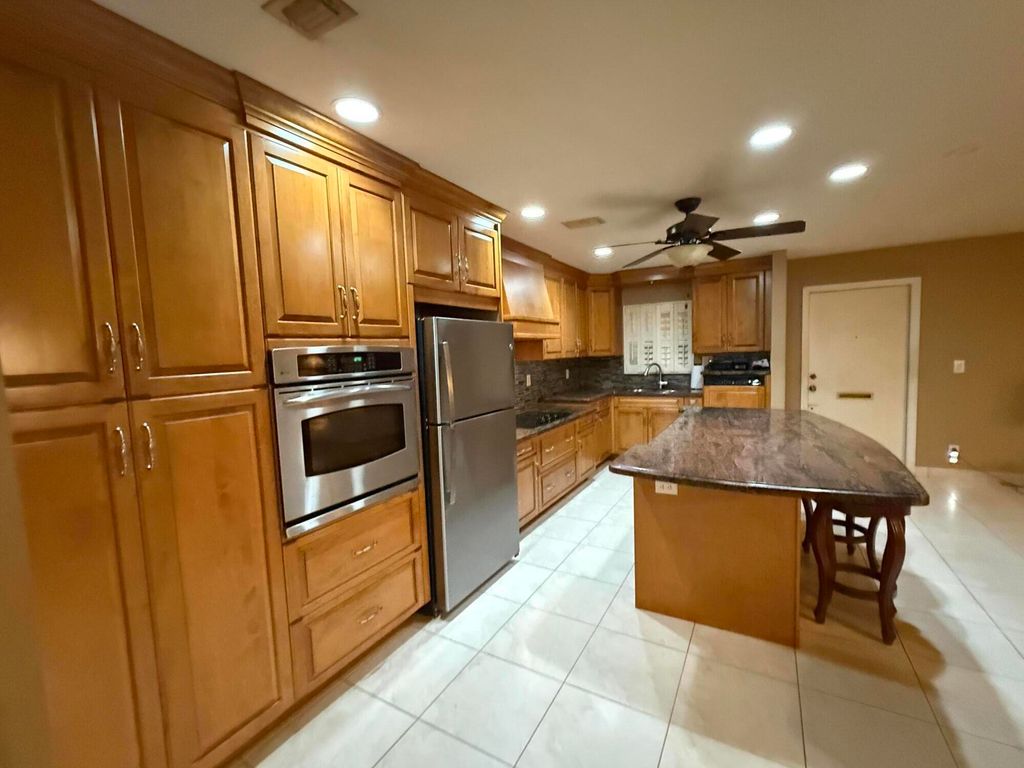 Photo of 220 Country Lane #A, Boynton Beach, FL 33435 (MLS # B26003061)