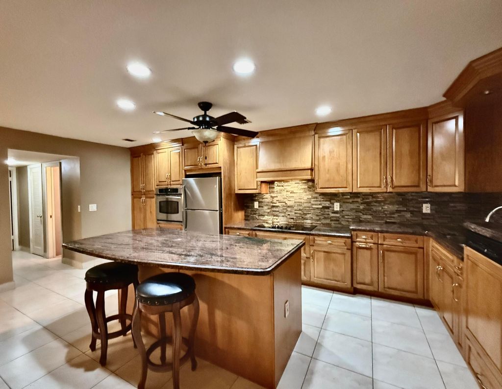 Photo of 220 Country Lane #A, Boynton Beach, FL 33435 (MLS # B26003061)