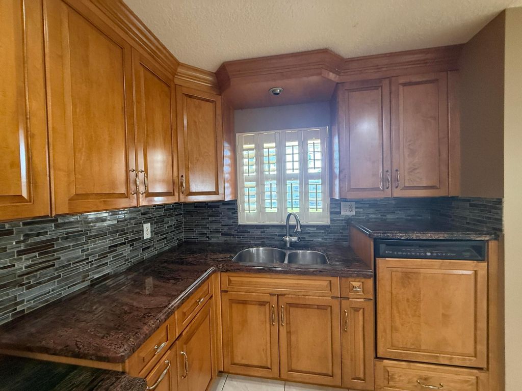 Photo of 220 Country Lane #A, Boynton Beach, FL 33435 (MLS # B26003061)