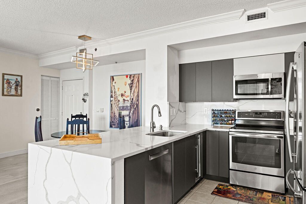 Photo of 616 Clearwater Park Road #1110, West Palm Beach, FL 33401 (MLS # B26021715)