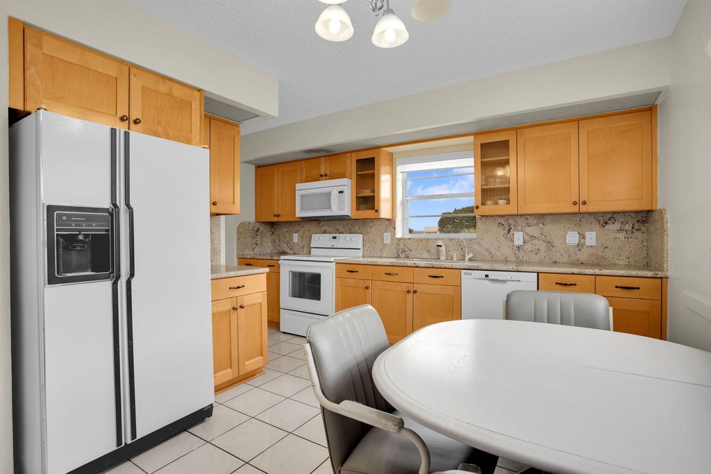 Photo of 1605 Abaco Drive #M4, Coconut Creek, FL 33066 (MLS # F10555307)