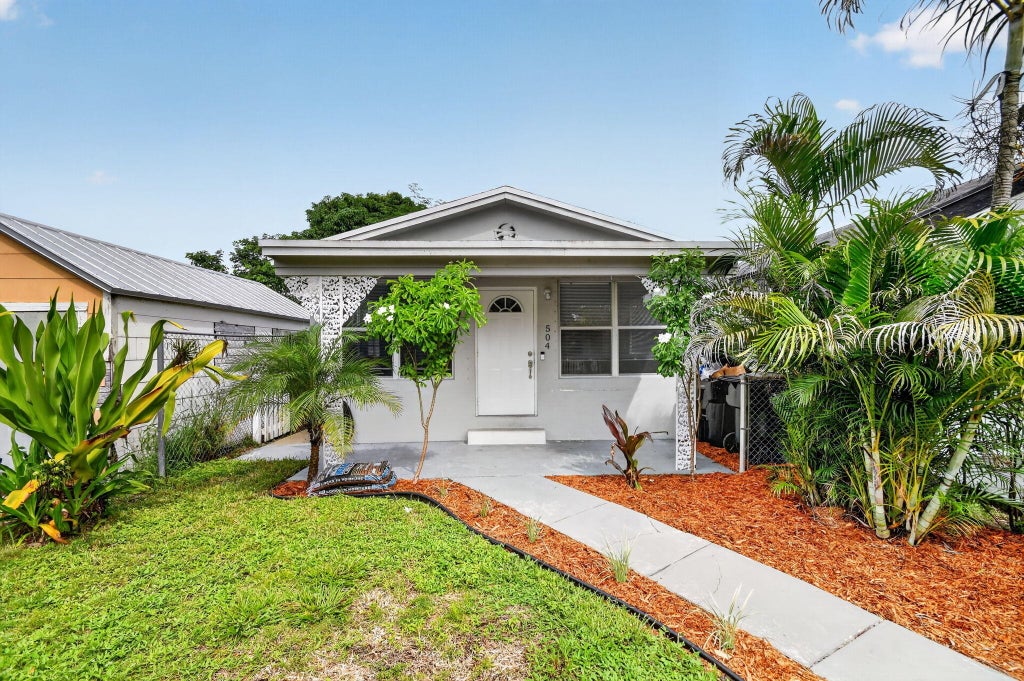 Photo of 504 N E Street, Lake Worth Beach, FL 33460 (MLS # B26075368)