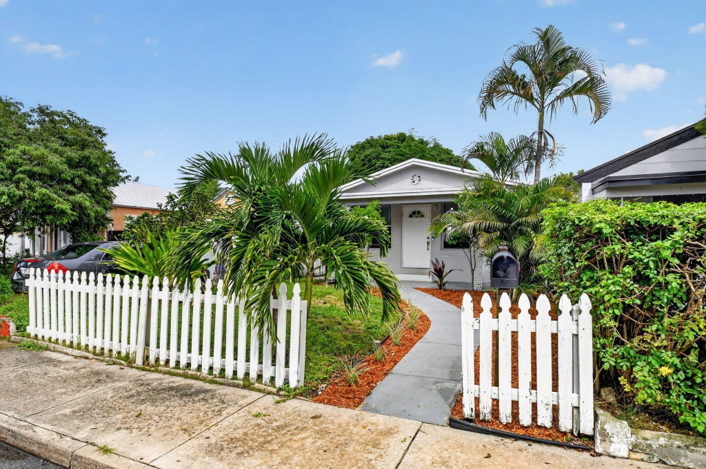 Photo of 504 N E Street, Lake Worth Beach, FL 33460 (MLS # B26075368)