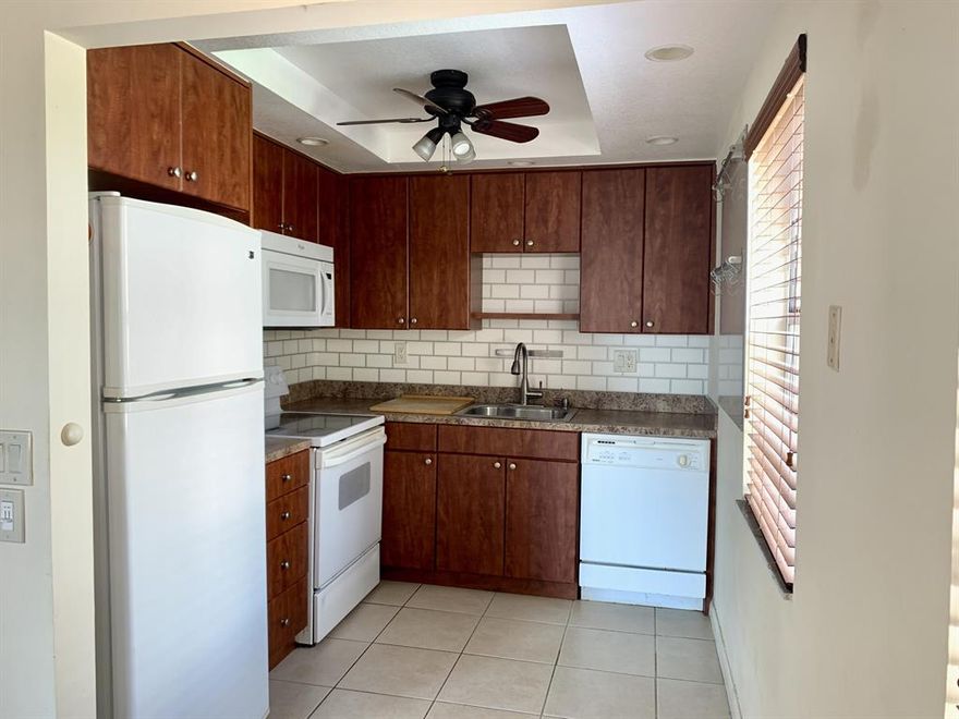 55+ COMMUNITY!! Unfurnished, 2/2 on the first floor that overlooks the golf course. Updated kitchen and bathrooms. Tile throughout. Enclosed patio with washer and dryer in closet. Community offers courtesy bus, pools, golf, pickle ball, multiple club houses, many activities and shows.