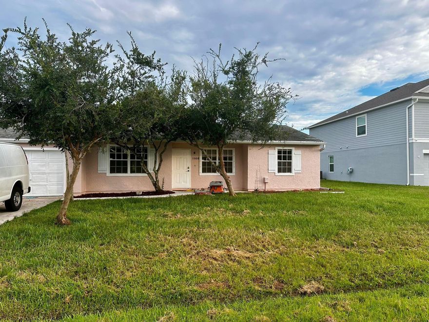Cozy 3-bedroom, 2-bath home with a 1-car garage in East Port St. Lucie! Just a quick drive to the beach and all the best local spots. Sitting on a big corner lot, the backyard comes with a deck that's perfect for hanging out, grilling, or just relaxing.