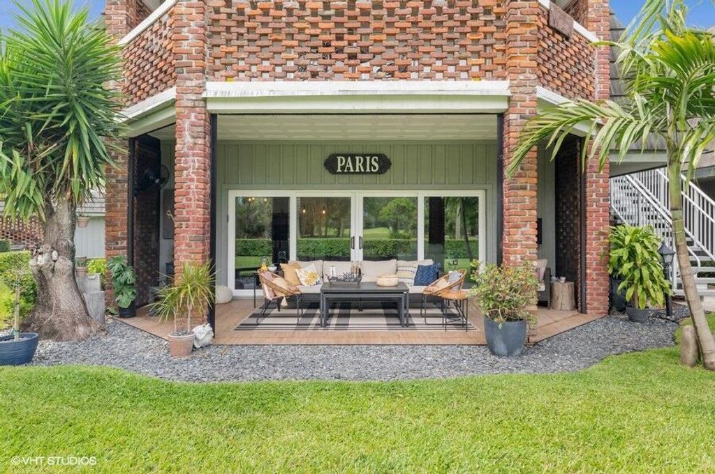 Photo of 400 Pine Villa Drive #3, Atlantis, FL 33462 (MLS # R10784560)