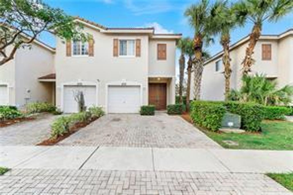 Photo of 8731 Cypress Walk Court, Tamarac, FL 33321 (MLS # B26005067)