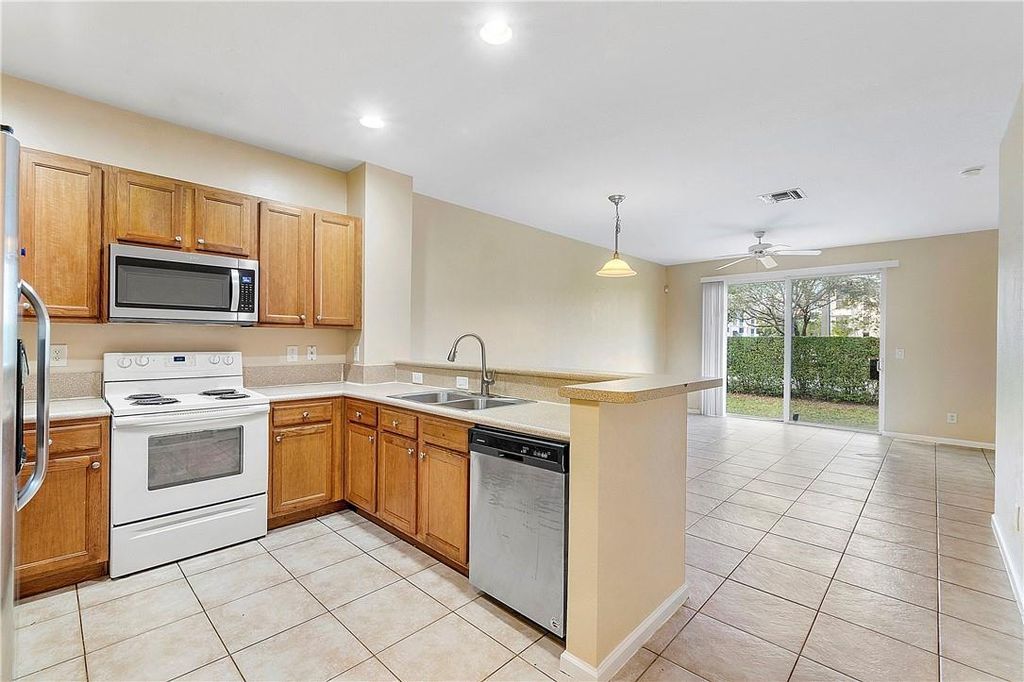 Photo of 8731 Cypress Walk Court, Tamarac, FL 33321 (MLS # B26005067)