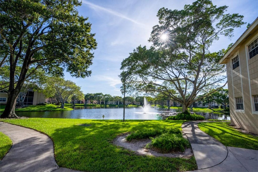 Photo of 640 Cypress Club Way #H12, Deerfield Beach, FL 33064 (MLS # F10474613)