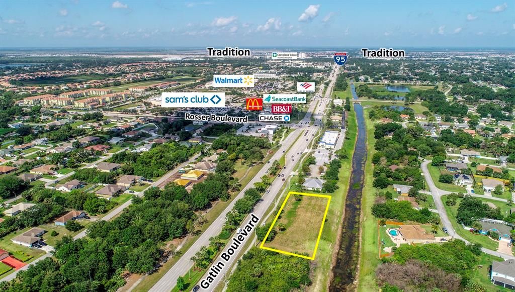 Photo of 1561 SW Gatlin Boulevard, Port Saint Lucie, FL 34953 (MLS # R10713258)