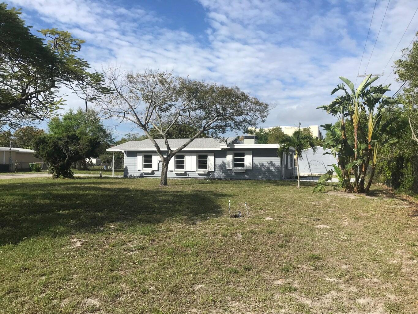 Highly sought out unique opportunity to rent a totally refurbished home on almost an acre of land with the freedom to park RV's and boats. Take advantage of the large 25x18 workshop with both power and water for your handyman dreams. 5 minutes from I-95 and close to downtown yet the feeling of being in the country. 1 large utility building for the tenants use. Don't miss out on this rare opportunity!