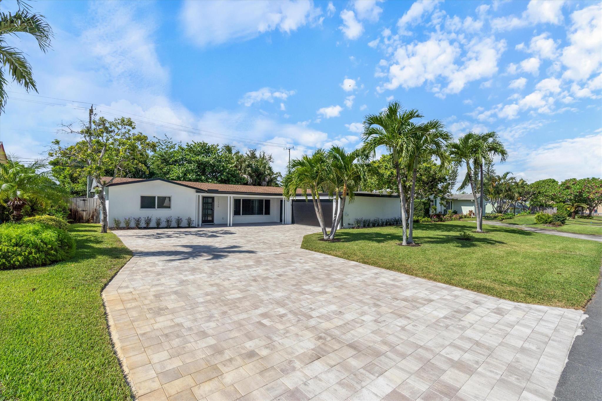 Discover this fully renovated 3-bedroom, 2-bath pool home in the coveted Chapel Hill neighborhood. Nestled on a quiet cul-de-sac, it offers the perfect mix of comfort and convenience just minutes from Downtown Delray and Atlantic Avenue. Recent upgrades include a new roof, A/C, impact windows, and a beautifully redesigned primary bath. The open, light-filled layout blends modern finishes with seamless indoor-outdoor living. Outside, enjoy a private backyard retreat with a spacious patio, sparkling pool, and cabana bath. No HOA and golf cart-friendly streets complete this exceptional offering.