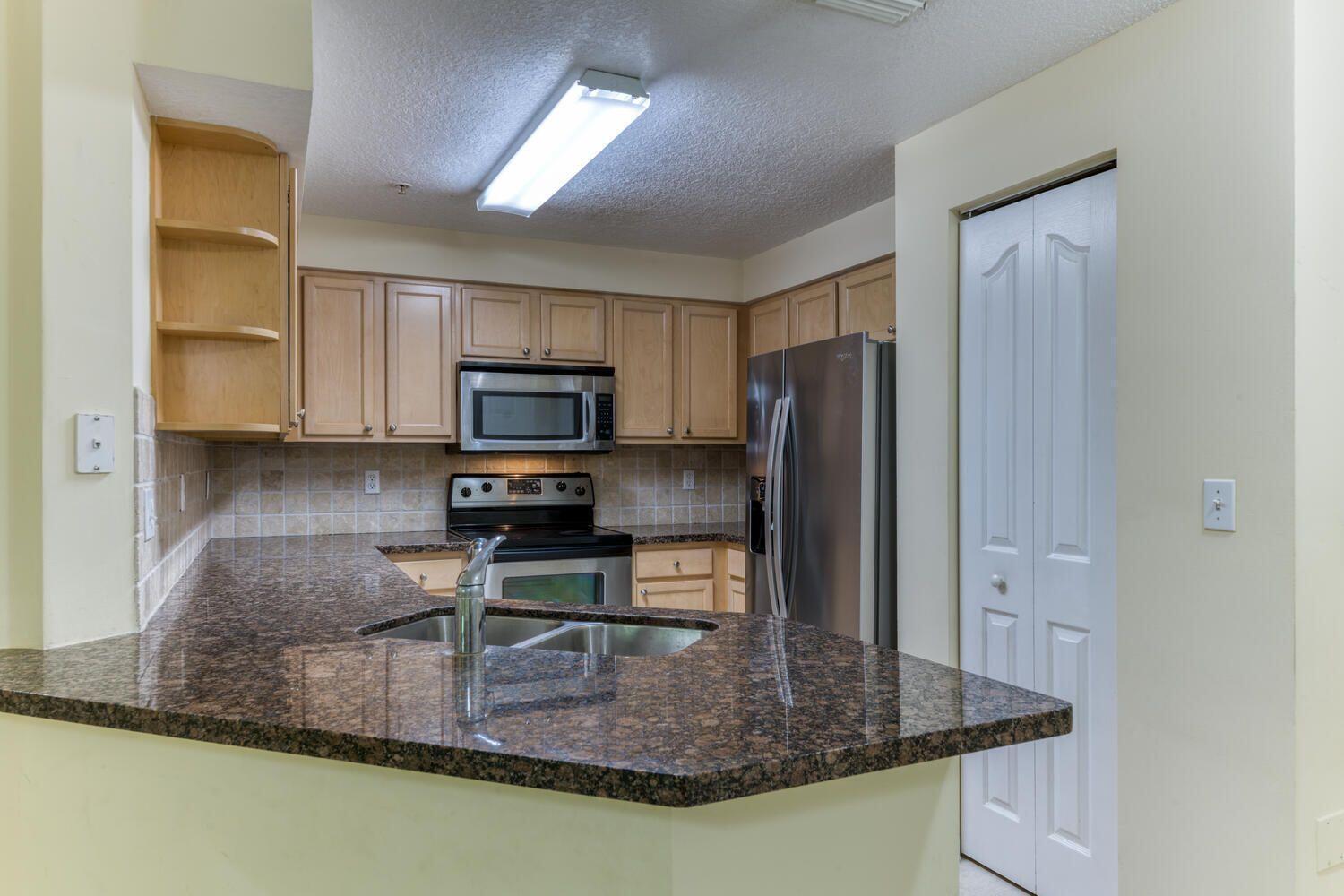 SOMERSET AT ABACOA CONDO - Residential Lease