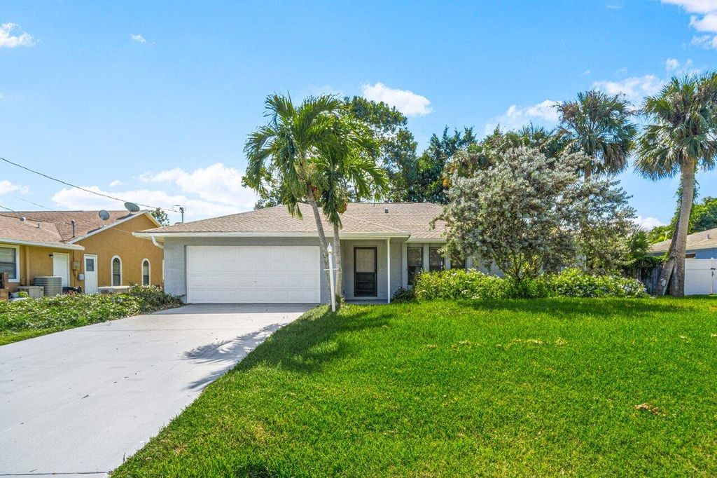 Photo of 572 SW Aster Road, Port St Lucie, FL 34953 (MLS # R10838184)
