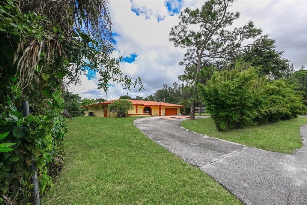 Photo of 8421 Pioneer Road, West Palm Beach, FL 33411 (MLS # F10527997)