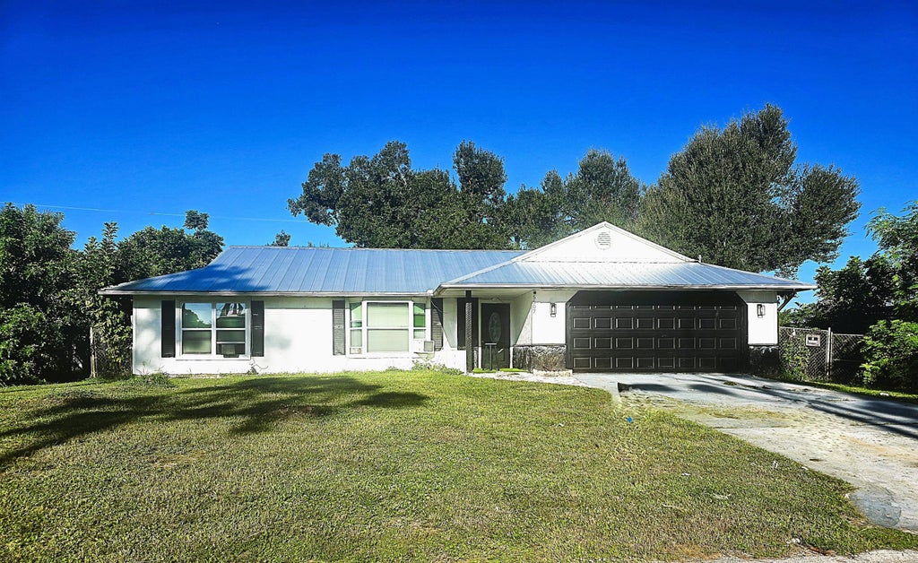 Photo of 5507 EASTWOOD Drive, Fort Pierce, FL 34951 (MLS # B26075585)