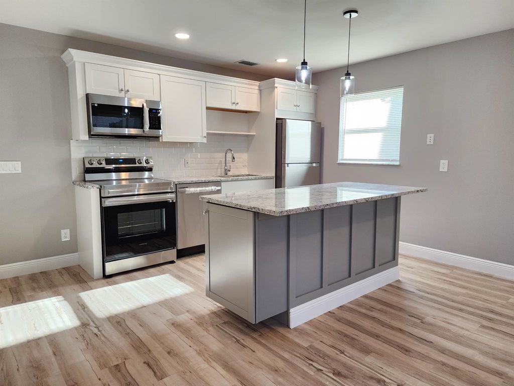 Photo of 10 Lake Vista Trail #105, Port St Lucie, FL 34952 (MLS # R10894945)