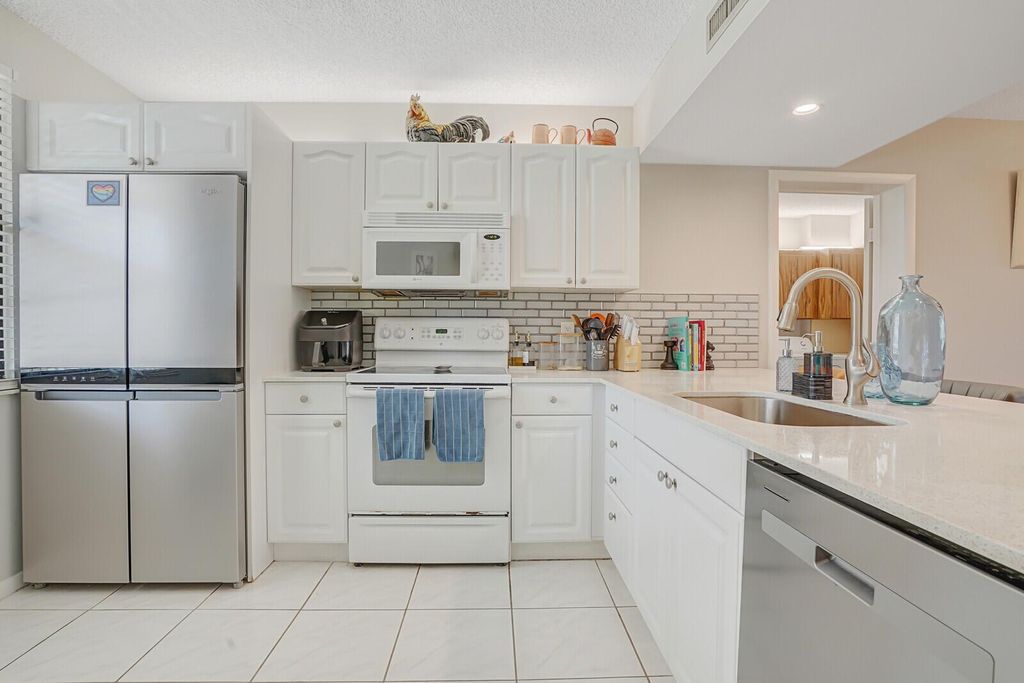 Photo of 6037 Balboa Circle #202, Boca Raton, FL 33433 (MLS # R11094209)