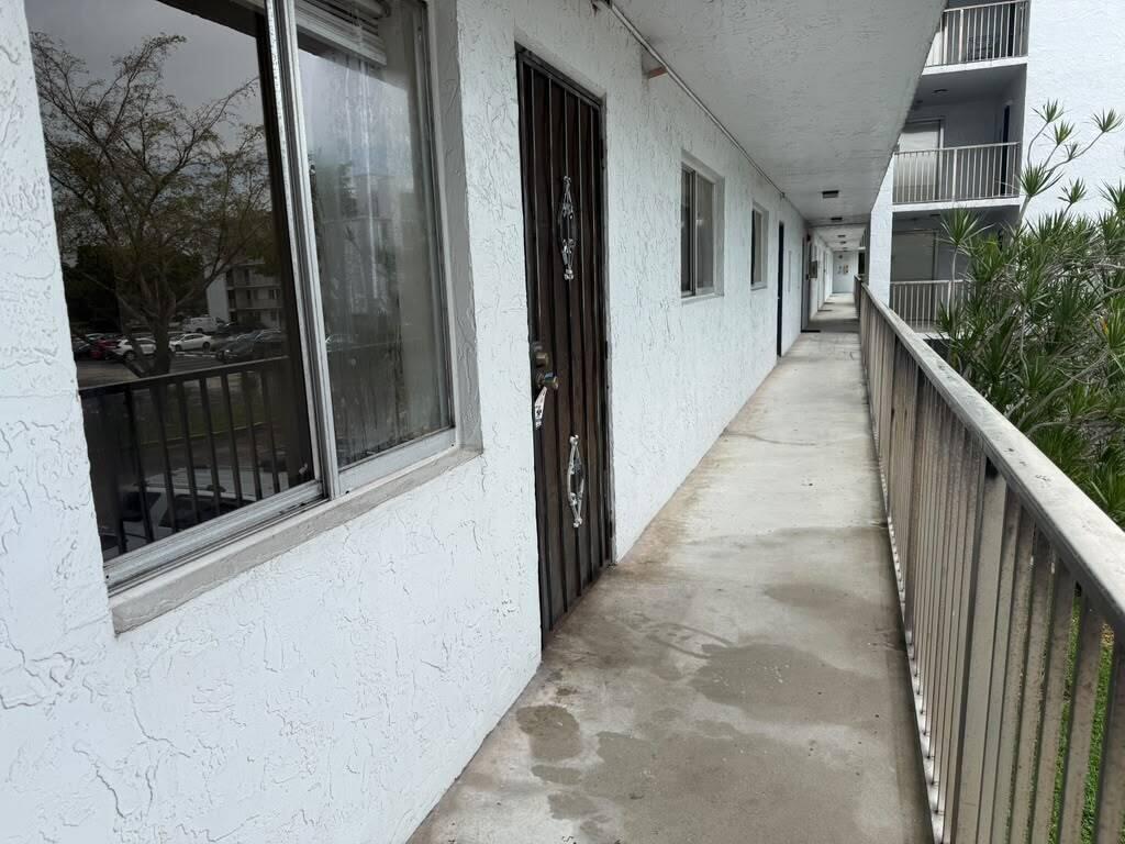 Photo of 8600 N Sherman Circle #202, Miramar, FL 33025 (MLS # B26075841)