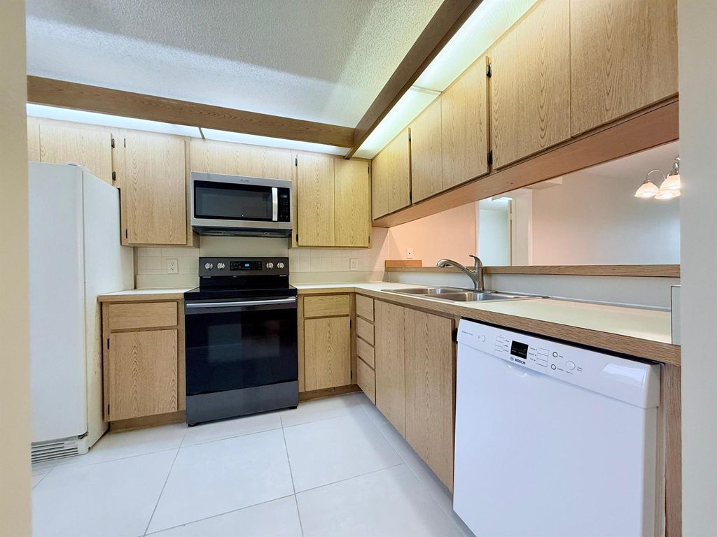 Photo of 2621 Village Boulevard #206, West Palm Beach, FL 33409 (MLS # R11112458)