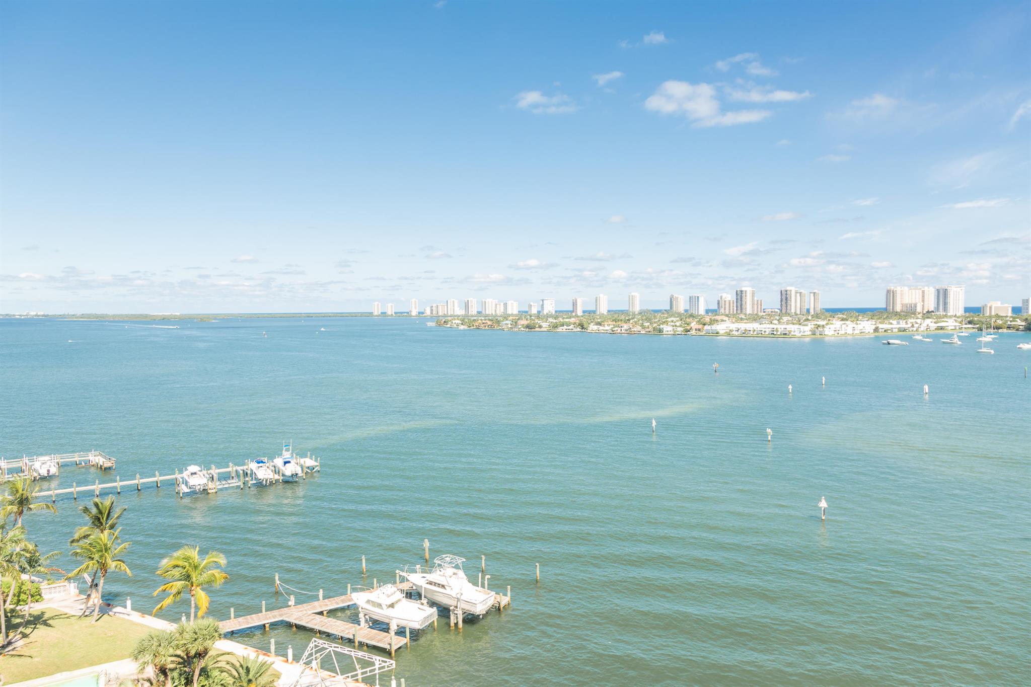 Resort style living in this newly renovated home while overlooking wide intracoastal and Ocean views of Singer Island & MacArthur park from this preferred 10th floor 2 bedroom 2 1/2 bath condo. Spacious, contemporary kitchen includes SS appliances, granite countertops w double SS sink and large pantry. Newer Bosch AC, polished 24x48 in. porcelain (NO CARPET)..Guest bd has its own bath with a large walk-in closet. Master bath includes a whirlpool tub w separate shower and w large walk-in closets. Amenities include 24 hr security guard, rooftop heated pool, tennis court/ pickle ball, bounce ball, exercise room, social room, sauna/steam room, billiard room card room, valet and a full service Marina located adjacent to the property. Short walk to the. Publix across the street. You must see!
