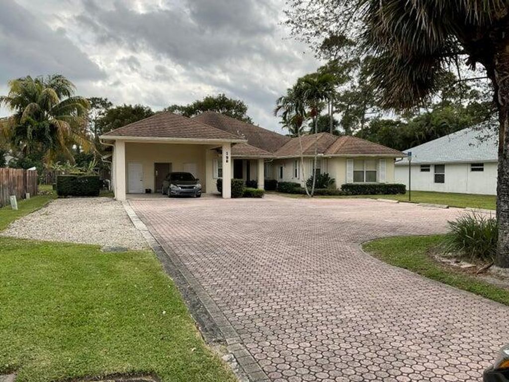 Photo of 198 Sparrow A Drive #A, Royal Palm Beach, FL 33411 (MLS # R11043574)