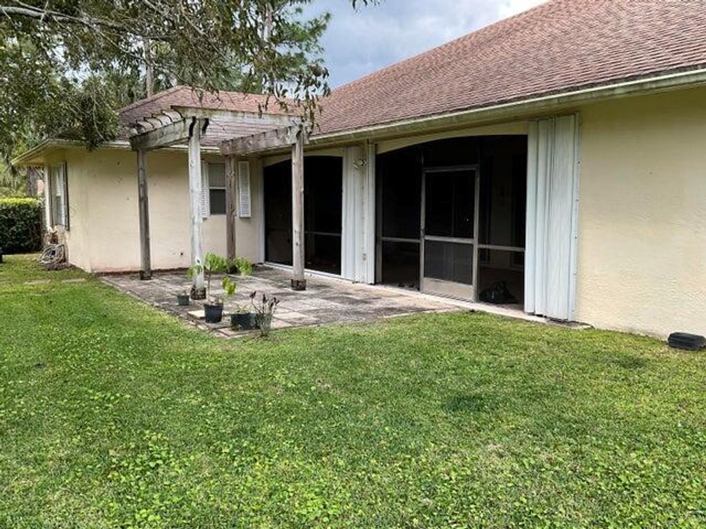 Photo of 198 Sparrow A Drive #A, Royal Palm Beach, FL 33411 (MLS # R11043574)