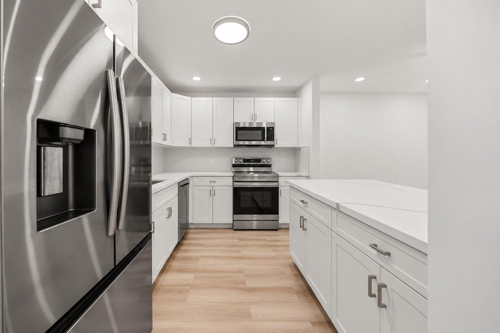 Photo of 5965 CARIBBEAN Boulevard, West Palm Beach, FL 33407 (MLS # B26085575)