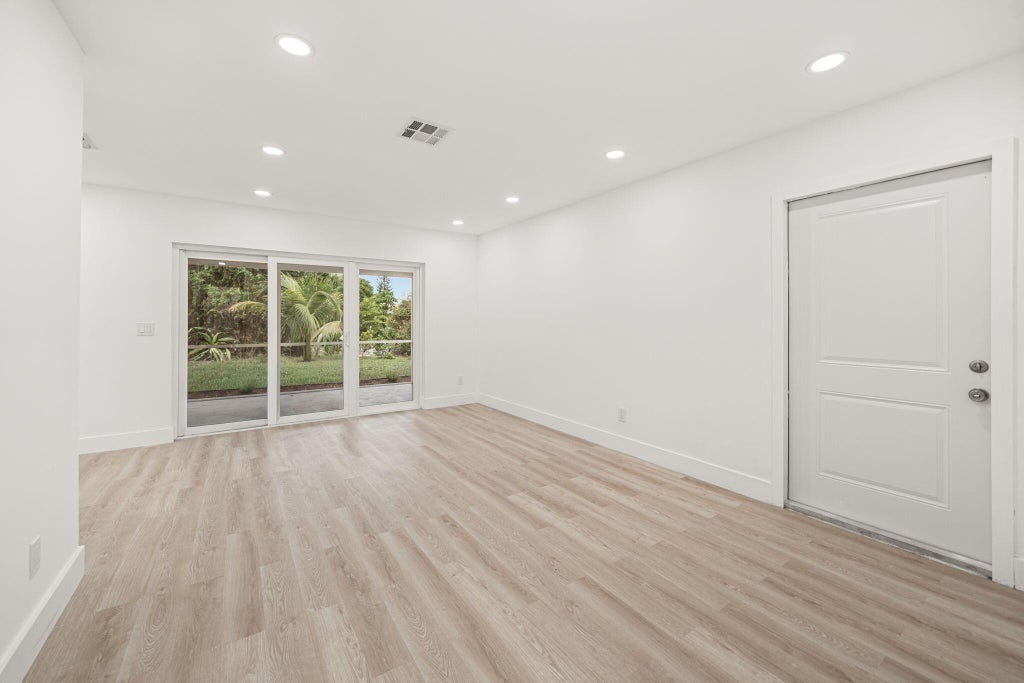 Photo of 5965 CARIBBEAN Boulevard, West Palm Beach, FL 33407 (MLS # B26085575)