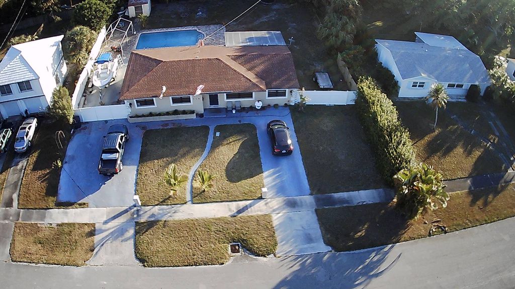 Photo of 716 Ilex Court, Lake Park, FL 33403 (MLS # R10789193)