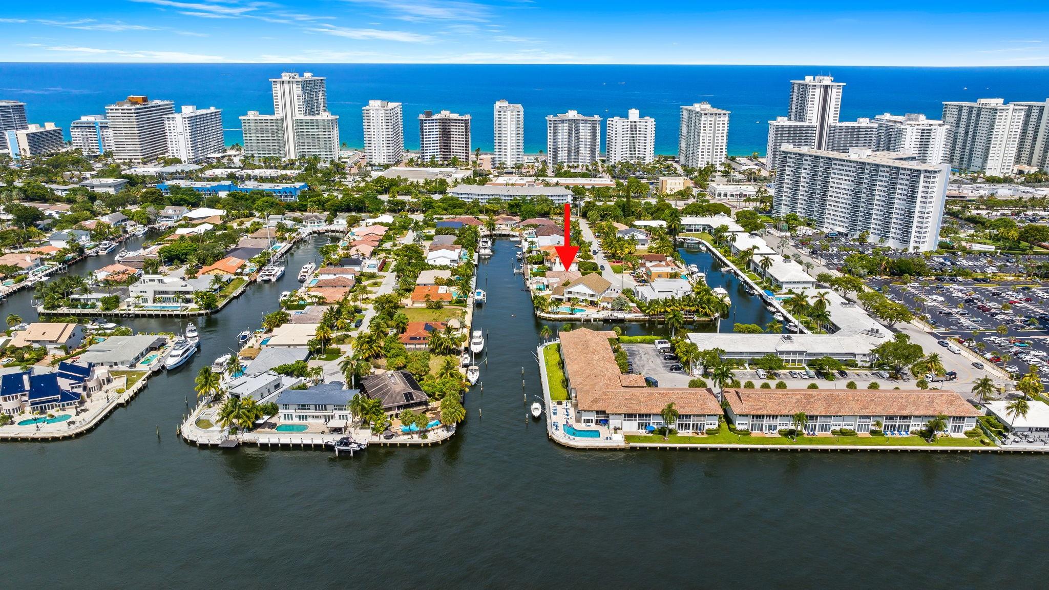 100' of deepwater frontage in the exclusive Bermuda Riviera with no fixed bridges—ideal for yacht owners & water enthusiasts! Fully furnished & move-in ready 4 bedrooms, 4 bathrooms home w/ 2,771 SF, split floor plan & private-entry guest suite. Enjoy a heated pool, jacuzzi, private dock, floating dock, oversized patio, cabana bath, BBQ area & outdoor lounge. Spacious kitchen with snack bar opens to bright living, dining & family areas. Bonus entertainment space with ping-pong table. Accordion shutters, 2 driveways, laundry room with extra storage. Located on a quiet cul-de-sac for added privacy near the beach, Las Olas, Coral Ridge Mall, Bayview Elementary, Lauderdale-by-the-Sea, Galleria Mall, golf, parks, airport, shops, restaurants, nightlife, and everything South Florida has to offer!