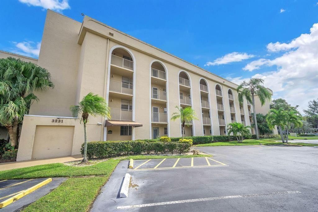 Photo of 3231 Holiday Springs Boulevard #105, Margate, FL 33063 (MLS # F10552039)