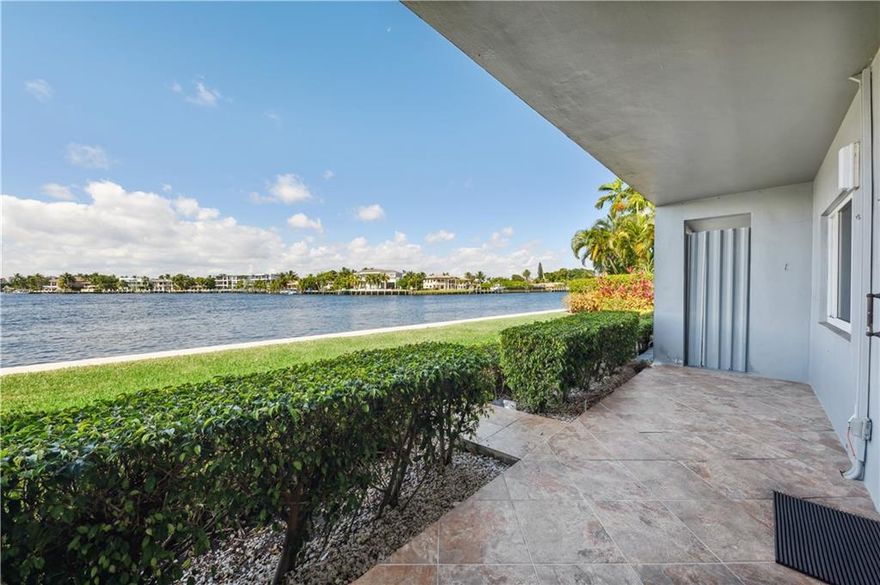 Come live in paradise and watch the boats every day from your porch- the views are UNREAL. This unit is directly on Lake Santa Barbara and has the most gorgeous sunsets. It is conveniently located in the heart of Pompano and is two blocks from the beach. This unit has a large spacious and open floor plan. The completely upgraded kitchen features white shaker cabinets, beautiful granite counter tops and newer appliances. The spacious bedroom has a huge walk in closet as well as a wall of full closet space. Amenities include; a Heated Pool set right on the Intracoastal and Lake Santa Barbara, common laundry on site (free) and a substantial extra storage closet.