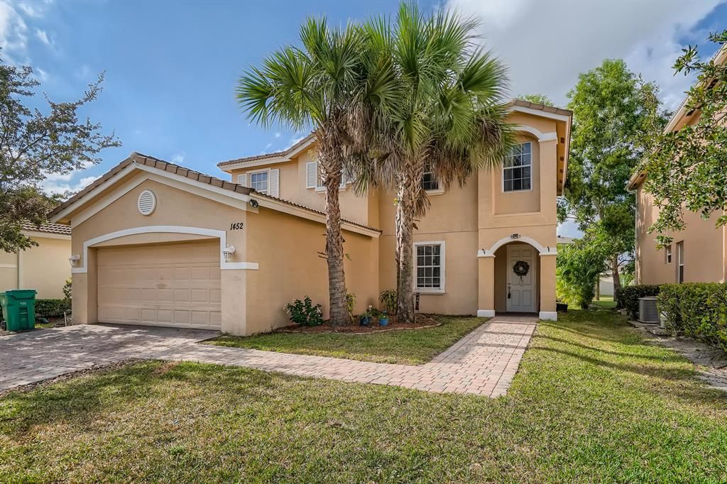 Photo of 1452 NW Leonardo Circle, Port Saint Lucie, FL 34986 (MLS # R10769463)